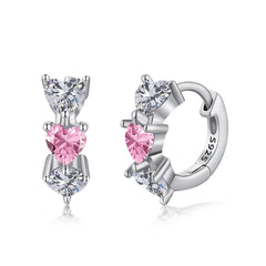 Oorringen met drie roze hartjes